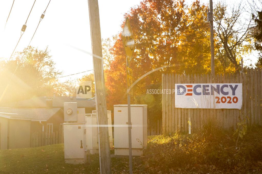 Joseph Cress A sign supporting Democratic presidential nominee Joe Biden reading, "Decency 2020," is seen as the sun sets prior to the general election, Sunday, Nov. 1, 2020, in Iowa City, Iowa. (Joseph Cress/Iowa City Press-Citizen via AP)