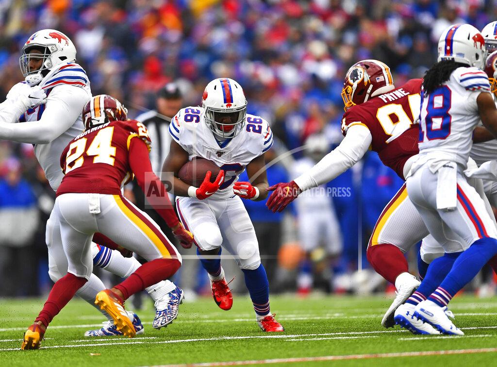 Adrian Kraus Buffalo Bills running back Devin Singletary (26) rushes for four yards during the first half of an NFL football game against the Washington Redskins, Sunday, Nov. 3, 2019, in Orchard Park, N.Y. (AP Photo/Adrian Kraus)