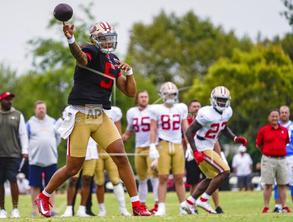 Damian Dovarganes San Francisco 49ers quarterback Trey Lance practices during a 49ers and Los Angeles Chargers joint NFL football team practice in Costa Mesa, Calif., Friday, Aug. 20, 2021. (AP Photo/Damian Dovarganes)