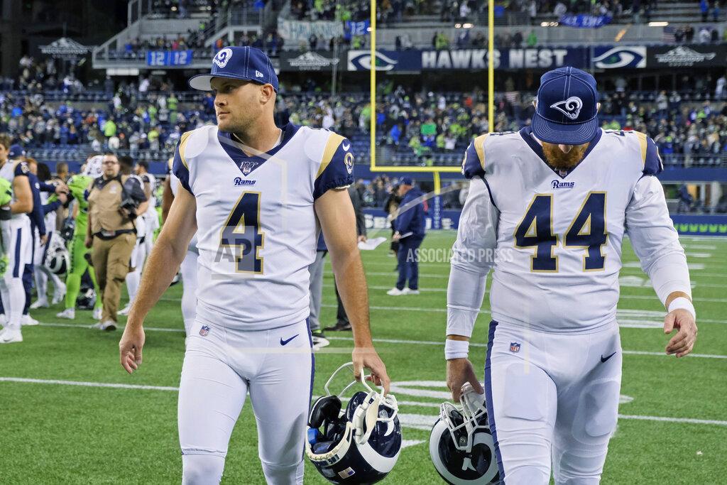 Stephen Brashear Los Angeles Rams' Greg Zuerlein (4) walks off the field with long snapper Jake McQuaide (44) after the team's NFL football game against the Seattle Seahawks, Thursday, Oct. 3, 2019, in Seattle. Zuerlein missed a last-minute field goal as the Seahawks won 30-29. (AP Photo/Stephen Brashear)