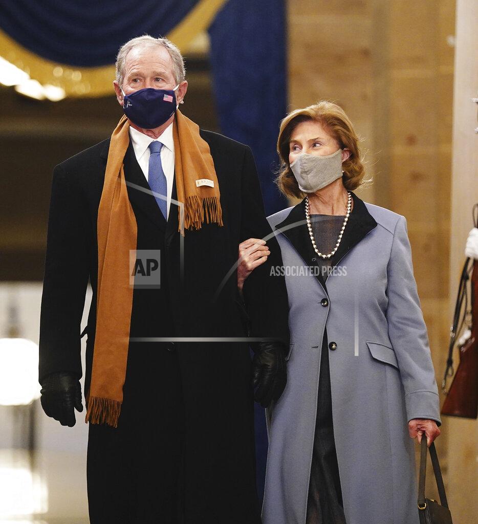 Jim Lo Scalzo Former President George W. Bush and Laura Bush arrive in the Crypt of the US Capitol for President-elect Joe Biden's inauguration ceremony on Wednesday, Jan. 20, 2021 in Washington. (Jim Lo Scalzo (Jim Lo Scalzo/Pool Photo via AP)