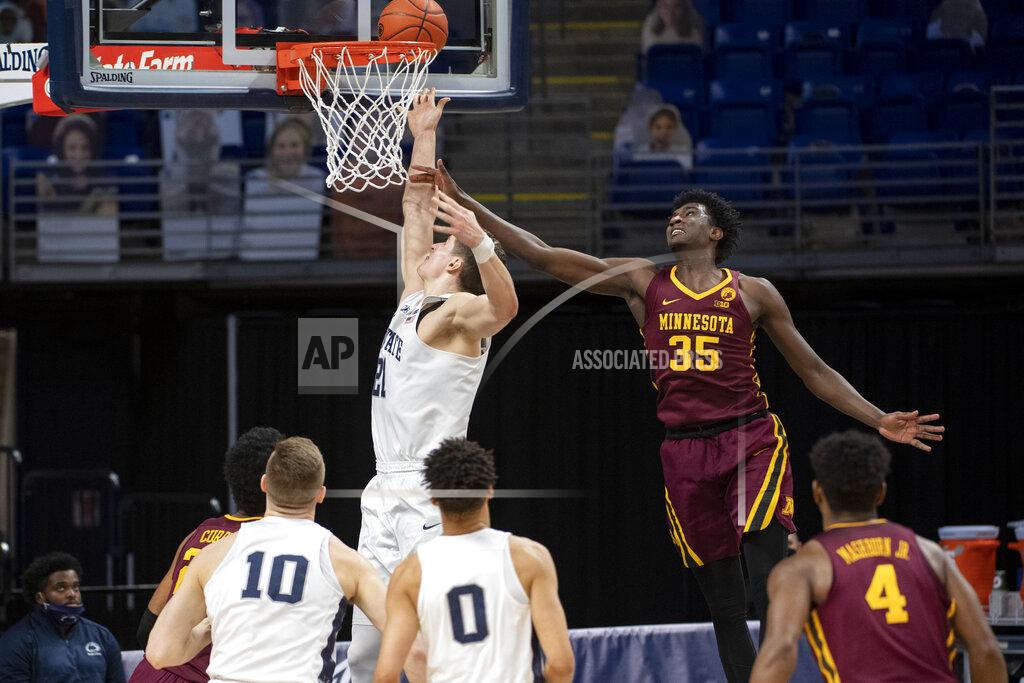 Noah Riffe Penn State forward John Harrar (21) lays up the ball while Minnesota forward Isaiah Ihnen (35) defends during an NCAA college basketball game Wednesday, March 3, 2021, in State College, Pa. (Noah Riffe/Centre Daily Times via AP)