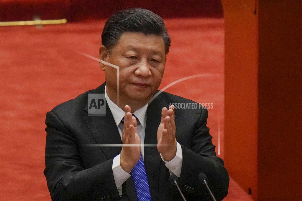 Andy Wong FILE - In this Oct. 9, 2021, file photo, Chinese President Xi Jinping applauds during an event commemorating the 110th anniversary of Xinhai Revolution at the Great Hall of the People in Beijing. After sending a record number of military aircraft to harass Taiwan over China’s National Day holiday weekend, Beijing has toned down the sabre rattling but tensions remain high, with the rhetoric and reasoning behind the exercises unchanged. (AP Photo/Andy Wong, File)