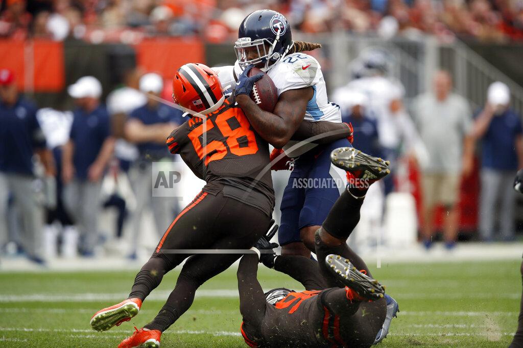 Jeff Haynes FILE - In this Sept. 8, 2019, file photo, Tennessee Titans running back Derrick Henry (22) is stopped by then-Cleveland Browns outside linebacker Christian Kirksey (58) during an NFL football game in Cleveland. Linebacker Christian Kirksey has agreed to terms on a deal with the Green Bay Packers less than a week after the Cleveland Browns released him. Kirksey’s agent, Brian Mackler, confirmed that Kirksey would be signing with the Packers but didn’t disclose terms.(AP Photo/Jeff Haynes, File)