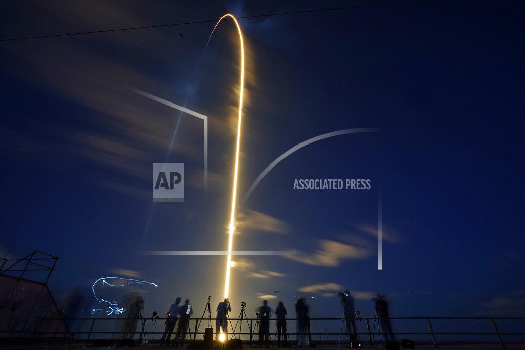 John Raoux A SpaceX Falcon 9 rocket, with four private citizens onboard, lifts off in this time-exposure photo from Kennedy Space Center's Launch Pad 39-A, Wednesday, Sept. 15, 2021, in Cape Canaveral, Fla. (AP Photo/John Raoux)