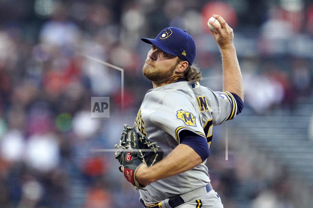 Jeff Chiu Milwaukee Brewers' Corbin Burnes pitches against the San Francisco Giants during the first inning of a baseball game in San Francisco, Monday, Aug. 30, 2021. (AP Photo/Jeff Chiu)