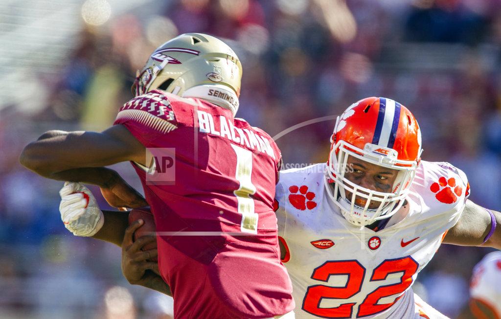 Mark Wallheiser Clemson defensive lineman Xavier Kelly, right, sacks Florida State back up quarterback James Blackman in the second half of an NCAA college football game in Tallahassee, Fla., Saturday, Oct.27, 2018. (AP Photo/Mark Wallheiser)