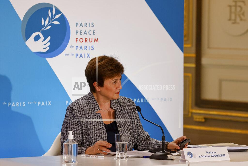 FILE - In this Nov. 12, 2020 file photo, International Monetary Fund Managing Director Kristalina Georgieva attends the Paris Peace Forum at The Elysee Palace in Paris. Georgieva said Tuesday, March 30, 2021, that when the IMF releases its updated economic forecast next week, it will show the global economy growing at a faster pace than the 5.5% gain it projected at the start of the year. (Ludovic Marin, Pool via AP)