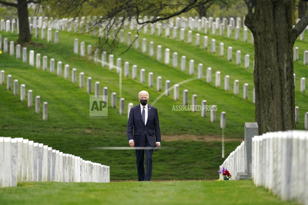 Andrew Harnik President Joe Biden visits Section 60 of Arlington National Cemetery in Arlington, Va., on Wednesday, April 14, 2021. Biden announced the withdrawal of the remainder of U.S. troops from Afghanistan by Sept. 11, 2021, the 20th anniversary of the terrorist attacks on America. (AP Photo/Andrew Harnik)