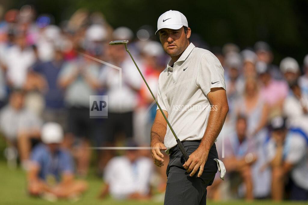 Eric Gay Scottie Scheffler watches his putt on the 15th hole during the second round of the PGA Championship golf tournament at Southern Hills Country Club, Friday, May 20, 2022, in Tulsa, Okla. (AP Photo/Eric Gay)