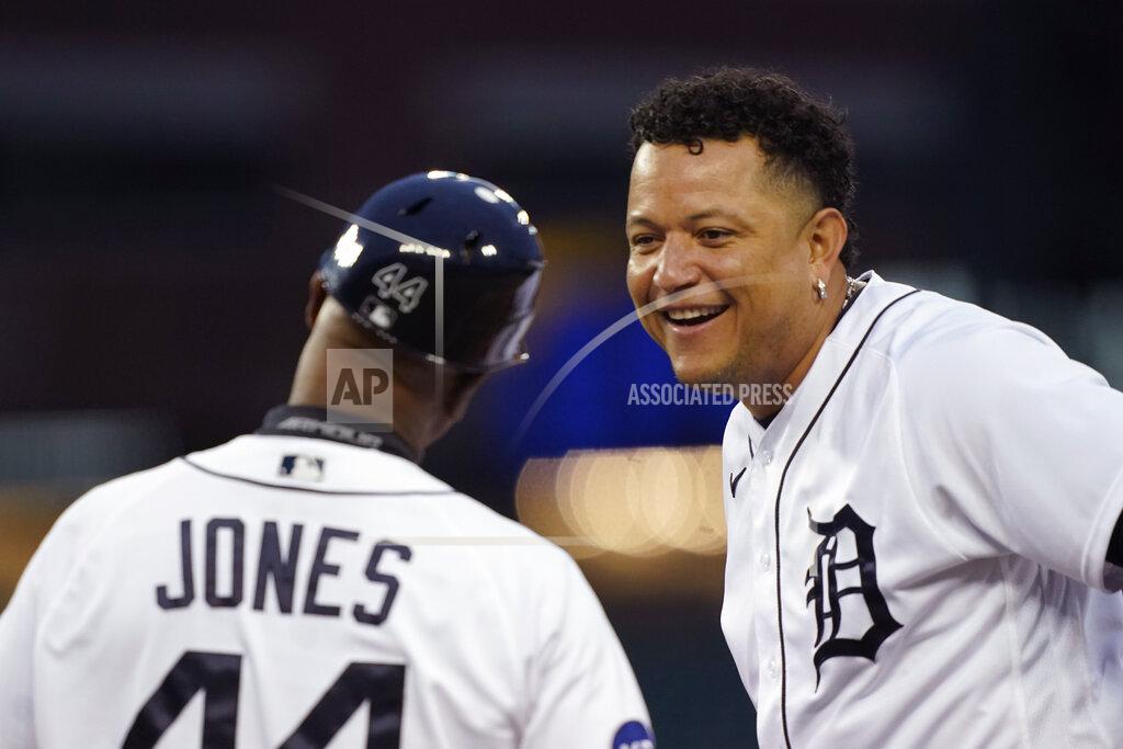 Carlos Osorio Detroit Tigers designated hitter Miguel Cabrera shares a laugh with first base coach Gary Jones after hitting a single during the fourth inning of a baseball game against the Cleveland Guardians, Thursday, May 26, 2022, in Detroit. (AP Photo/Carlos Osorio)