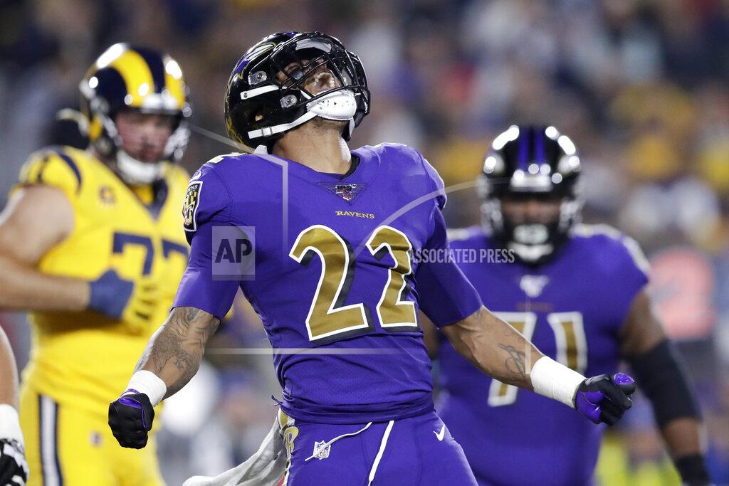 Baltimore Ravens cornerback Jimmy Smith celebrates after sacking Los Angeles Rams quarterback Jared Goff during the first half of an NFL football game Monday, Nov. 25, 2019, in Los Angeles. (AP Photo/Marcio Jose Sanchez)
