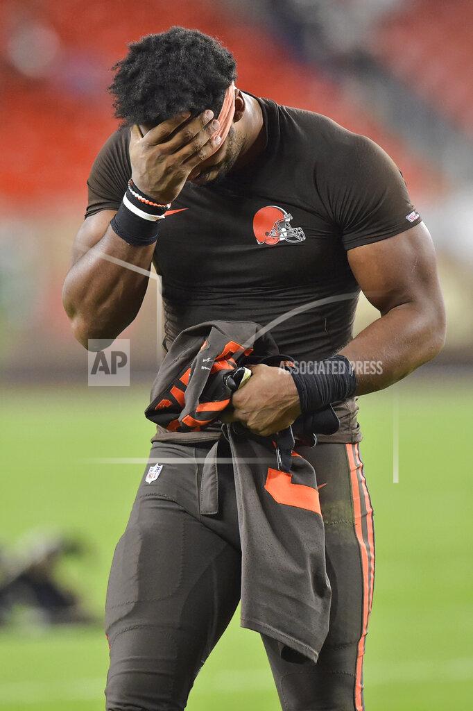 David Richard Cleveland Browns defensive end Myles Garrett holds his head as he walks off the field after the Los Angeles Rams defeated the Browns 20-13 in an NFL football game, Sunday, Sept. 22, 2019, in Cleveland. (AP Photo/David Richard)
