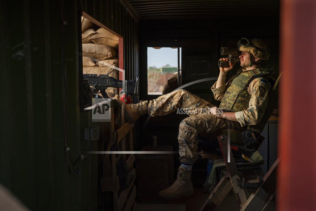Uncredited An Estonian Barkhane force soldier mans the entrance of the base in Gao, Mali Sunday June 6, 2021. French President Emmanuel Macron announced at a press conference Thursday June 10, 2021 That operation Barkhane would end and be replaced by support for local partners and counter terrorism. (AP Photo/Jerome Delay)