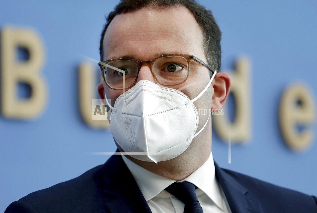 Michael Sohn FILE - In this Tuesday, Nov. 3, 2020 file photo, German Health Minister Jens Spahn arrives for a press conference in Berlin, Germany. The coronavirus pandemic is colliding with politics as Germany embarks on its vaccination drive and one of the most unpredictable election years in its post-World War II history. (AP Photo/Michael Sohn, file, pool)