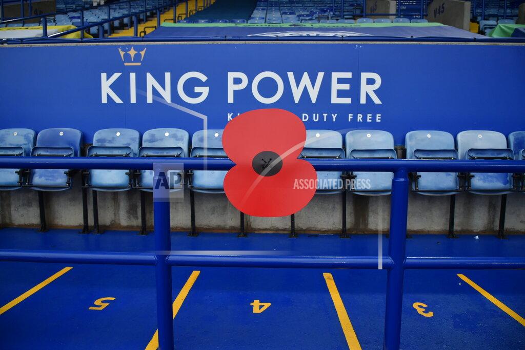 Rui Vieira A giant poppy to mark Remembrance Sunday decorating the stands before the English Premier League soccer match between Leicester City and Wolverhampton Wanderers at the King Power Stadium in Leicester, England, Sunday, Nov. 8, 2020. (AP Photo/Rui Vieira, Pool)