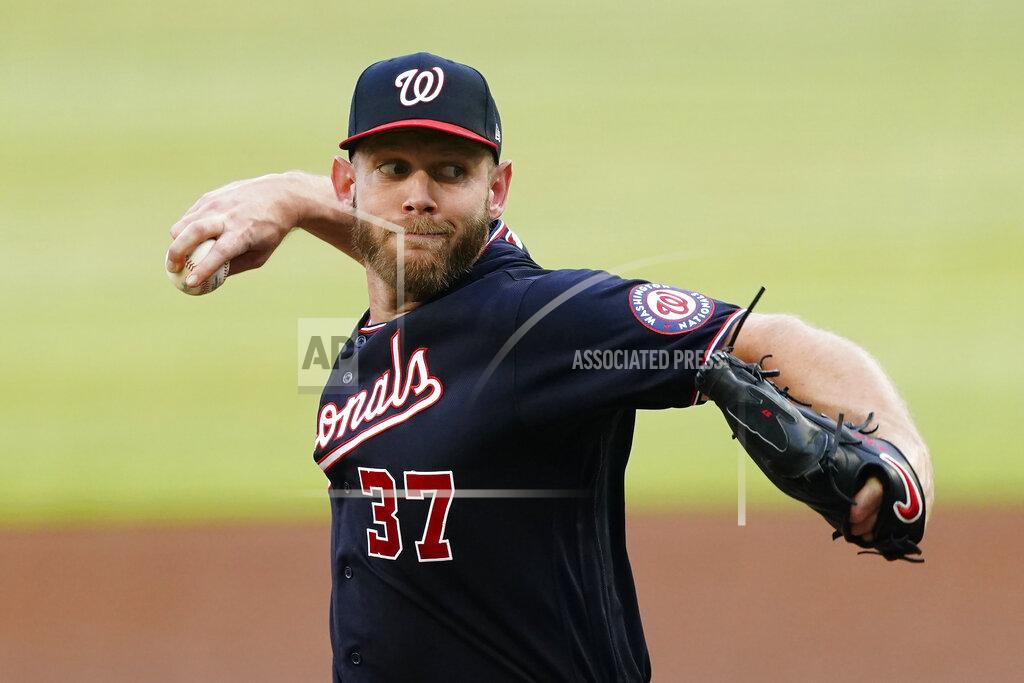 John Bazemore FILE - In this June 1, 2021, file photo, Washington Nationals starting pitcher Stephen Strasburg delivers in the first inning of a baseball game against the Atlanta Braves in Atlanta. Strasburg felt some discomfort in his neck after a recent bullpen session, and Washington manager Dave Martinez said Friday, July 23, 2021, the team is trying to figure out what to do next. (AP Photo/John Bazemore, File)