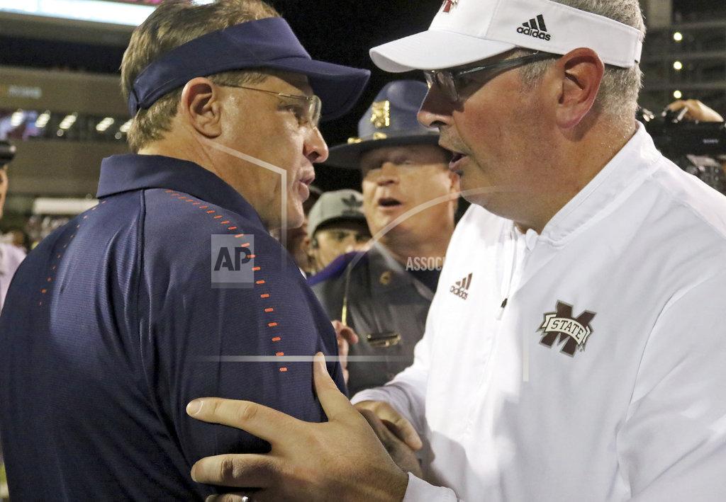 Jim Lytle Auburn coach Gus Malzahn, left congratulates Mississippi State coach Joe Moorhead after an NCAA college football game Saturday, Oct. 6, 2018, in Starkville, Miss. MSU won 23-9. (AP Photo/Jim Lytle)