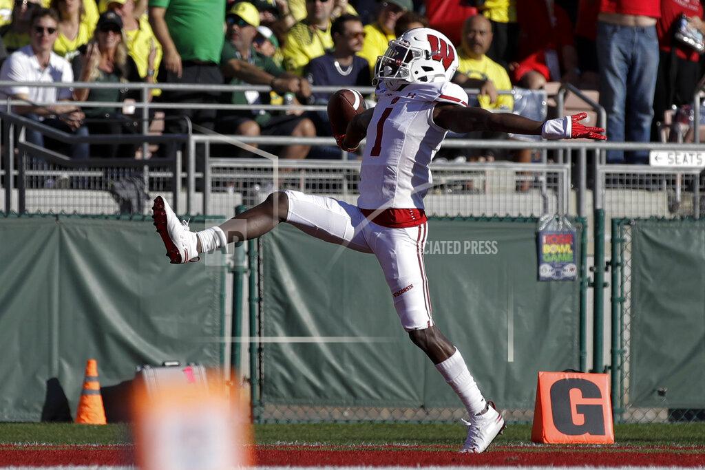 Marcio Jose Sanchez Wisconsin wide receiver Aron Cruickshank celebrates after scoring against Oregon during first half of the Rose Bowl NCAA college football game Wednesday, Jan. 1, 2020, in Pasadena, Calif. (AP Photo/Marcio Jose Sanchez)