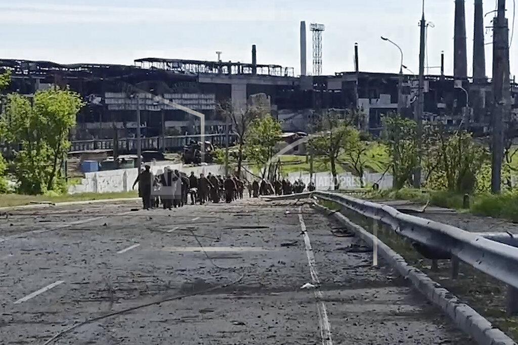 Uncredited In this photo taken from video released by the Russian Defense Ministry Press Service on Wednesday, May 18, 2022, Ukrainian servicemen leave the besieged Azovstal steel plant in Mariupol, Ukraine. (Russian Defense Ministry Press Service via AP)