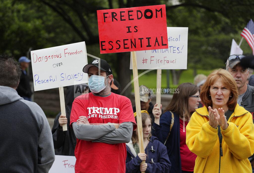 Eric Gay Protesters rally at the Texas State Capitol to speak out against Texas' handling of the COVID-19 outbreak, in Austin, Texas, Saturday, April 18, 2020. Austin and many other Texas cities remain under stay-at-home orders due to the COVID-19 outbreak except for essential personal. (AP Photo/Eric Gay)