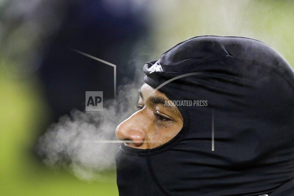 Darron Cummings Seattle Seahawks' George Fant warms up before an NFL divisional playoff football game against the Green Bay Packers Sunday, Jan. 12, 2020, in Green Bay, Wis. (AP Photo/Darron Cummings)
