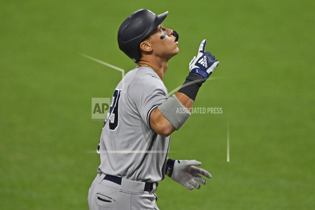 David Dermer New York Yankees' Aaron Judge (99) runs the bases after hitting a two-run home run off Cleveland Indians starting pitcher Shane Bieber (57) in the first inning of Game 1 of an American League wild-card baseball series, Tuesday, Sept. 29, 2020, in Cleveland. (AP Photo/David Dermer)
