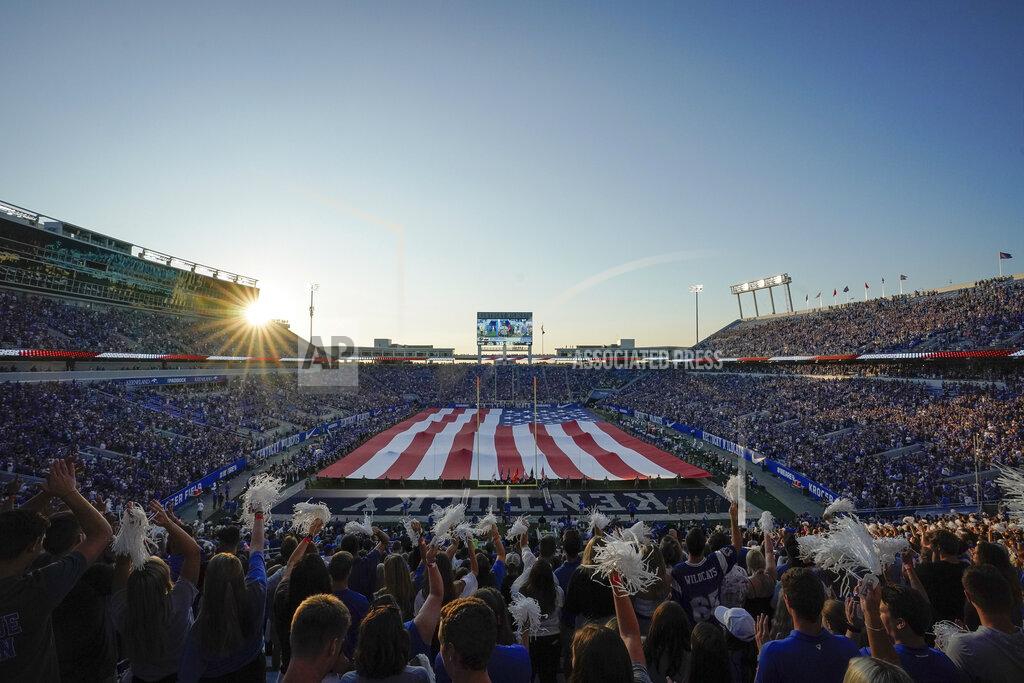 Bryan Woolston A large American Flag is stretched across the Kroger Field prior to an NCAA college football game between Kentucky and Eastern Michigan, Saturday, Sept. 7, 2019, in Lexington, Ky. (AP Photo/Bryan Woolston)