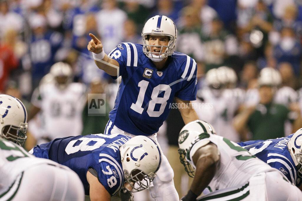 Nam Y. Huh FILE - In this Saturday, Jan. 8, 2011 file photo, Indianapolis Colts quarterback Peyton Manning (18) calls signals during the second quarter of an NFL AFC wild card football playoff game between the New York Jets and the Indianapolis Colts in Indianapolis. Mention the NFL draft, and the debate begins immediately. Who’s the best player ever taken at No. 1 overall or the top player ever taken in a late round?(AP Photo/Nam Y. Huh, File)