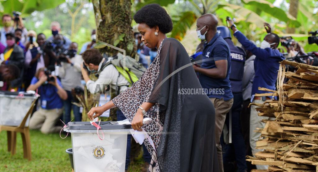 Nicholas Bamulanzeki Uganda's leading opposition challenger Bobi Wine's wife, Barbie Kyagulanyi, casts her vote in Kampala, Uganda, Thursday, Jan. 14, 2021. Ugandans are voting in a presidential election tainted by widespread violence that some fear could escalate as security forces try to stop supporters of Wine from monitoring polling stations.(AP Photo/Nicholas Bamulanzeki)