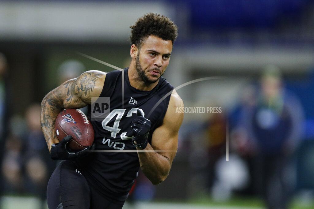 Michael Conroy FILE - In this Feb. 27, 2020, file photo, USC wide receiver Michael Pittman runs a drill at the NFL football scouting combine in Indianapolis. Pittman was selected by the Indianapolis Colts in the second round of the NFL football draft Friday, April 24, 2020. (AP Photo/Michael Conroy, File)