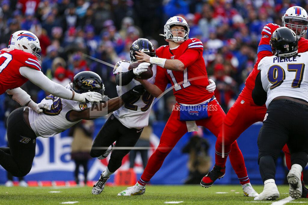 John Munson Buffalo Bills quarterback Josh Allen (17) has the ball stripped by Baltimore Ravens free safety Earl Thomas (29) and Matt Judon (99) during the second half of an NFL football game in Orchard Park, N.Y., Sunday, Dec. 8, 2019. The Bills recovered the fumble. (AP Photo/John Munson)
