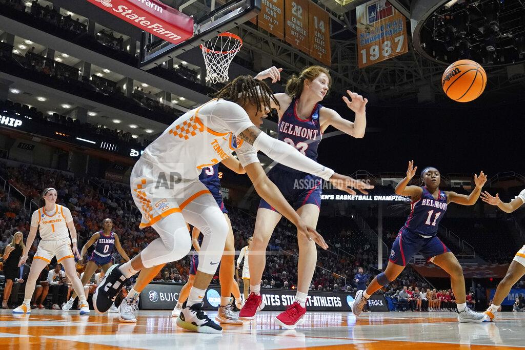 Mark Humphrey Tennessee's Alexus Dye (2) passes the ball away from Belmont's Nikki Baird (23) in the second half of a women's college basketball game in the second round of the NCAA tournament Monday, March 21, 2022, in Knoxville, Tenn. (AP Photo/Mark Humphrey)