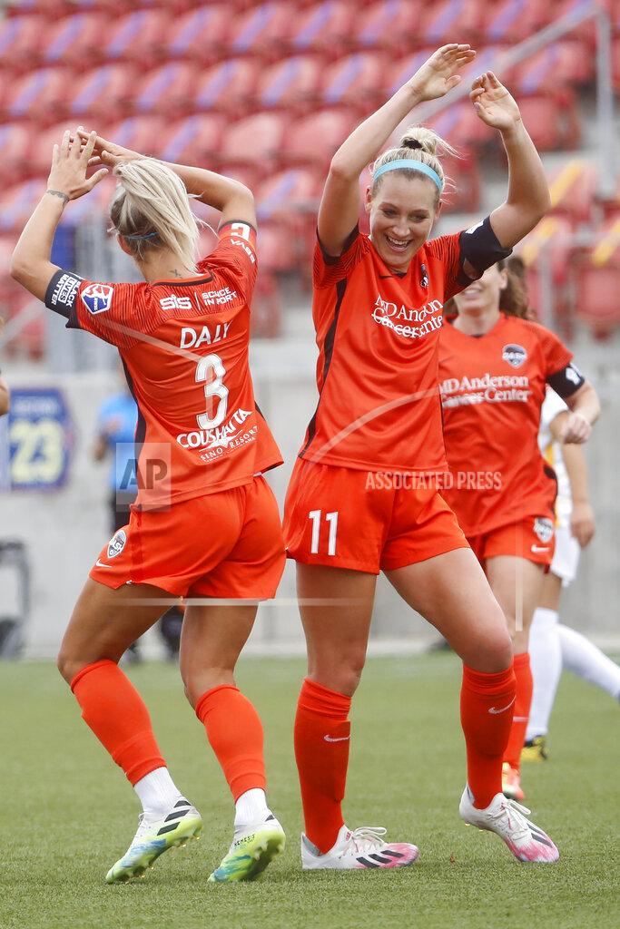 Rick Bowmer Houston Dash forward Rachel Daly (3) celebrates with teammate Megan Oyster (11) after scoring against Utah Royals FC during the first half of an NWSL Challenge Cup soccer match at Zions Bank Stadium Tuesday, June 30, 2020, in Herriman, Utah. (AP Photo/Rick Bowmer)