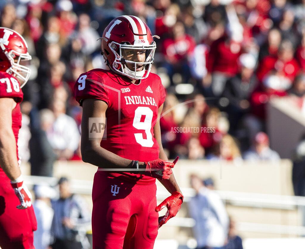 Doug Mcschooler FILE - In this Oct. 20, 2018, file photo, Indiana quarterback Michael Penix Jr. (9) looks to the sideline during the first half of an NCAA college football game, in Bloomington, Ind. Peyton Ramsey will battle Penix and Jack Tuttle for the starting quarterback job. (AP Photo/Doug McSchooler, File)