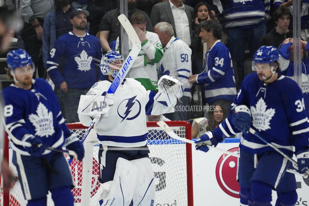 Frank Gunn Tampa Bay Lightning goaltender Andrei Vasilevskiy (88) celebrates after defeating the Toronto Maple Leafs in Game 7 of an NHL hockey first-round playoff series in Toronto, Saturday, May 14, 2022. (Frank Gunn/The Canadian Press via AP)