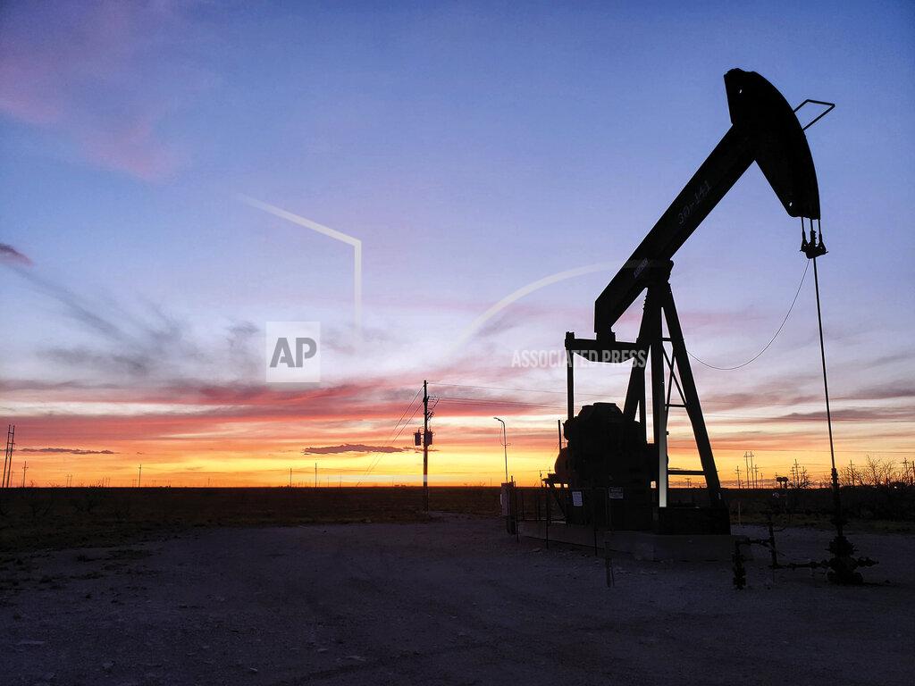 Blake Ovard FILE - This April 8, 2020 file photo shows a pump jack near Hobbs, N.M. New Mexico is now the nation's second largest oil producing state, and environmental regulators say more needs to be done to rein in pollution from the industry. (Blake Ovard/The Hobbs Daily News-Sun via AP, File)