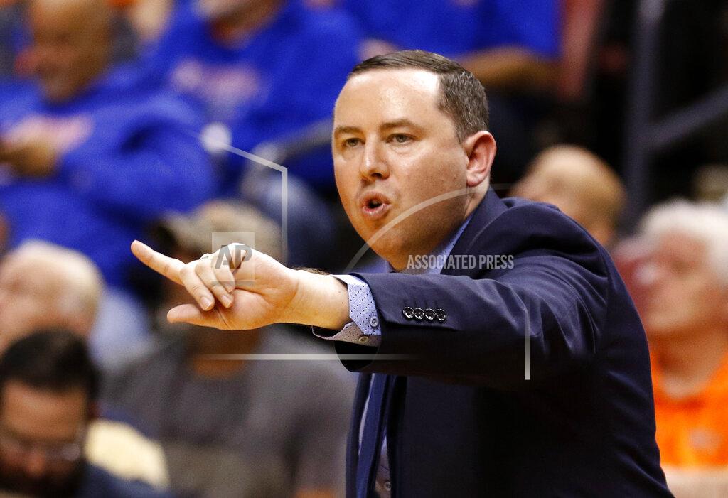 Joe Skipper FILE - In this Dec. 22, 2018, file photo, Florida Gulf Coast coach Michael Fly gestures during the team's NCAA college basketball game against Florida at the Orange Bowl Classic in Sunrise, Fla. Fly, now the head coach at Florida Gulf Coast, was an assistant on the 2013 “Dunk City” team that became the first No. 15 seed to make it out of the tournament's first weekend. (AP Photo/Joe Skipper, File)