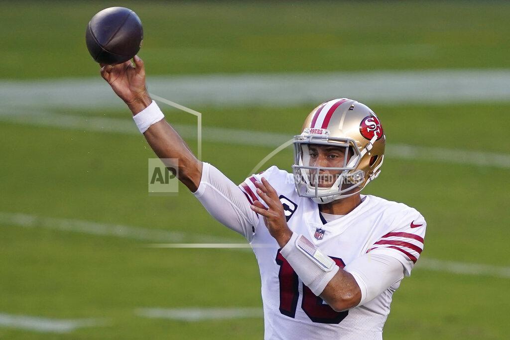 Tony Avelar San Francisco 49ers quarterback Jimmy Garoppolo passes against the Los Angeles Rams during the first half of an NFL football game in Santa Clara, Calif., Sunday, Oct. 18, 2020. (AP Photo/Tony Avelar)