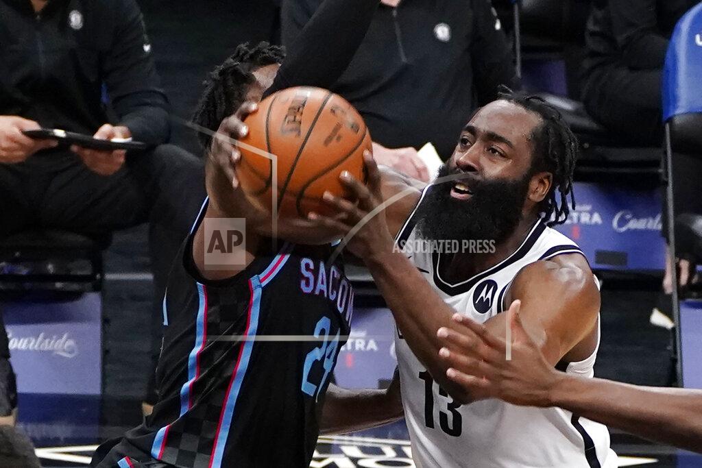 Rich Pedroncelli Brooklyn Nets guard James Harden, right, goes to the basket against Sacramento Kings guard Buddy Hield, left, during the first half of an NBA basketball game in Sacramento, Calif., Monday, Feb. 15, 2021. (AP Photo/Rich Pedroncelli)