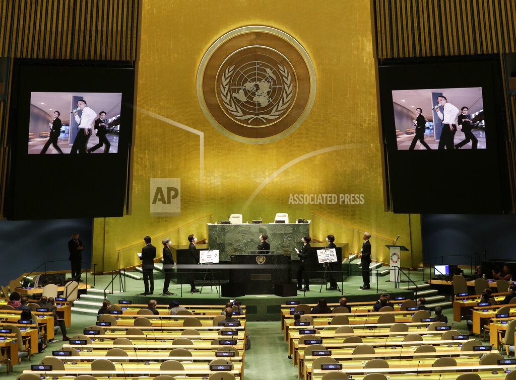 John Angelillo Members of South Korean K-pop band BTS watch a music video on the General Assembly Hall monitors during a meeting on Sustainable Development Goals at the 76th session of the U.N. General Assembly at U.N. headquarters on Monday, Sept. 20, 2021. (John Angelillo/Pool Photo via AP)