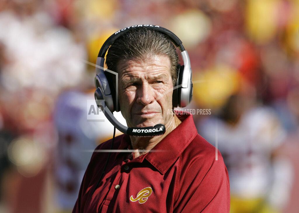 Manuel Balce Ceneta FILE - In this Sept. 23, 2007, file photo, Washington Redskins assistant head coach-offensive Joe Bugel looks on during an NFL football game in Landover, Md. Former Redskins assistant coach Bugel has died. He was 80. The team announced that Bugel died on Sunday, June 28, 2020. It did not disclose a cause of death. (AP Photo/Manuel Balce Ceneta, File)