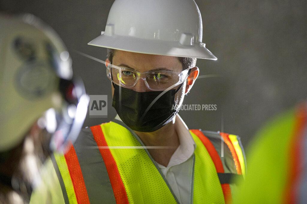 Alyssa Pointer FILE - In this May 21, 2021, file photo Secretary of Transportation Pete Buttigieg receives a tour of an underground tunnel for the expansion of the Hartsfield–Jackson Atlanta International Airport plane train tunnel at the Hartsfield–Jackson Atlanta International Airport in Atlanta. (Alyssa Pointer/Atlanta Journal-Constitution via AP, File)