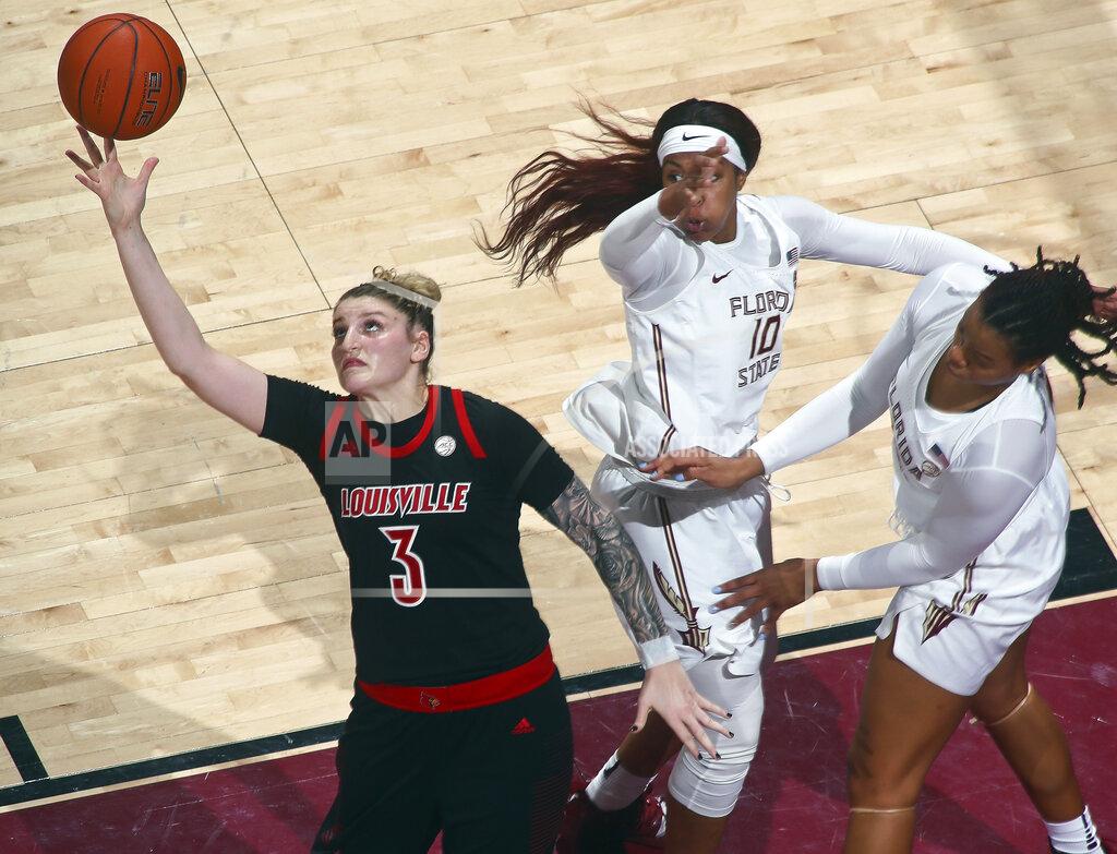 Phil Sears Louisville forward Sam Fuehring (3) reaches for a loose ball as Florida State guard Kourtney Weber (10) and forward Valencia Myers (32) defend during the first half of an NCAA college basketball game in Tallahassee, Fla., Thursday, Jan. 24, 2019. (AP Photo/Phil Sears)