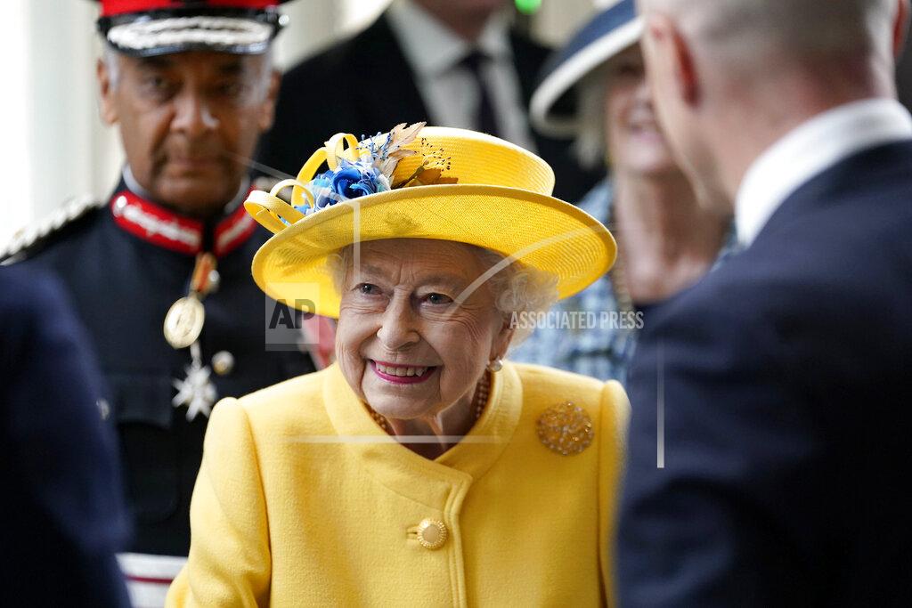 Andrew Matthews Britain's Queen Elizabeth II meets staff who have been key to the Crossrail project, as well as Elizabeth Line staff who will be running the railway, including apprentices, drivers, and station staff at Paddington station in London, to mark the completion of London's Crossrail project, Tuesday, May 17, 2022. (Andrew Matthews/PA via AP)