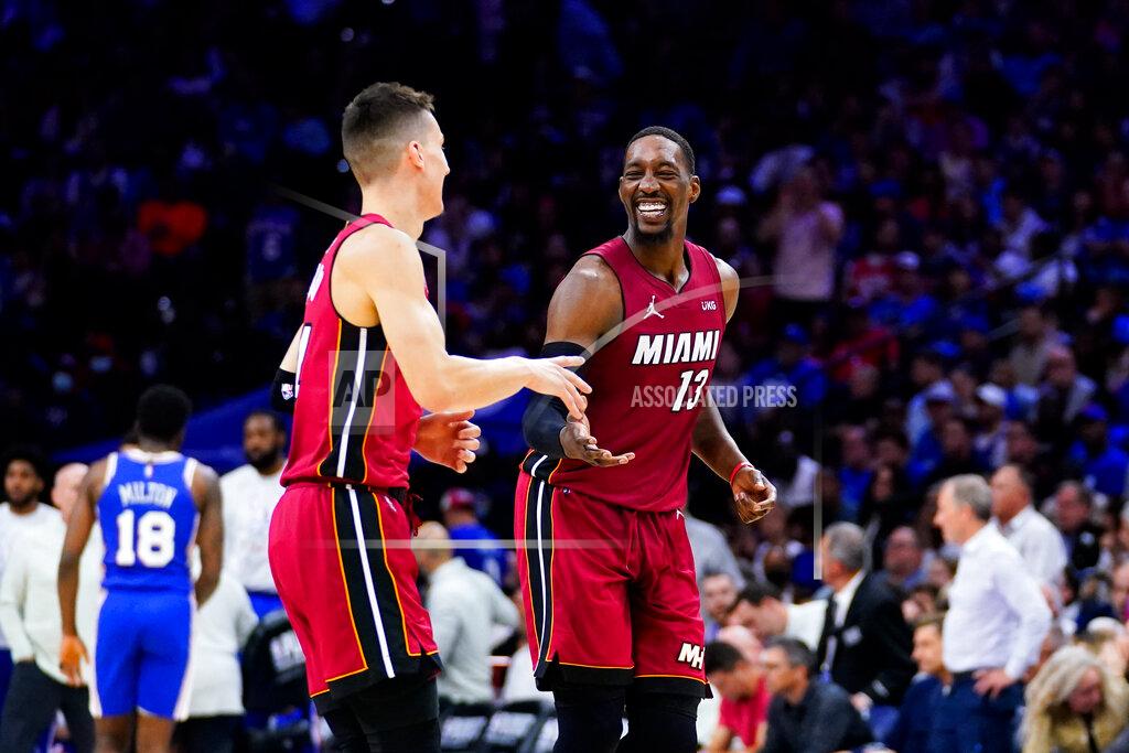 Matt Slocum Miami Heat's Tyler Herro, left, and Miami Heat's Bam Adebayo celebrate during the second half of Game 6 of an NBA basketball second-round playoff series against the Philadelphia 76ers, Thursday, May 12, 2022, in Philadelphia. (AP Photo/Matt Slocum)