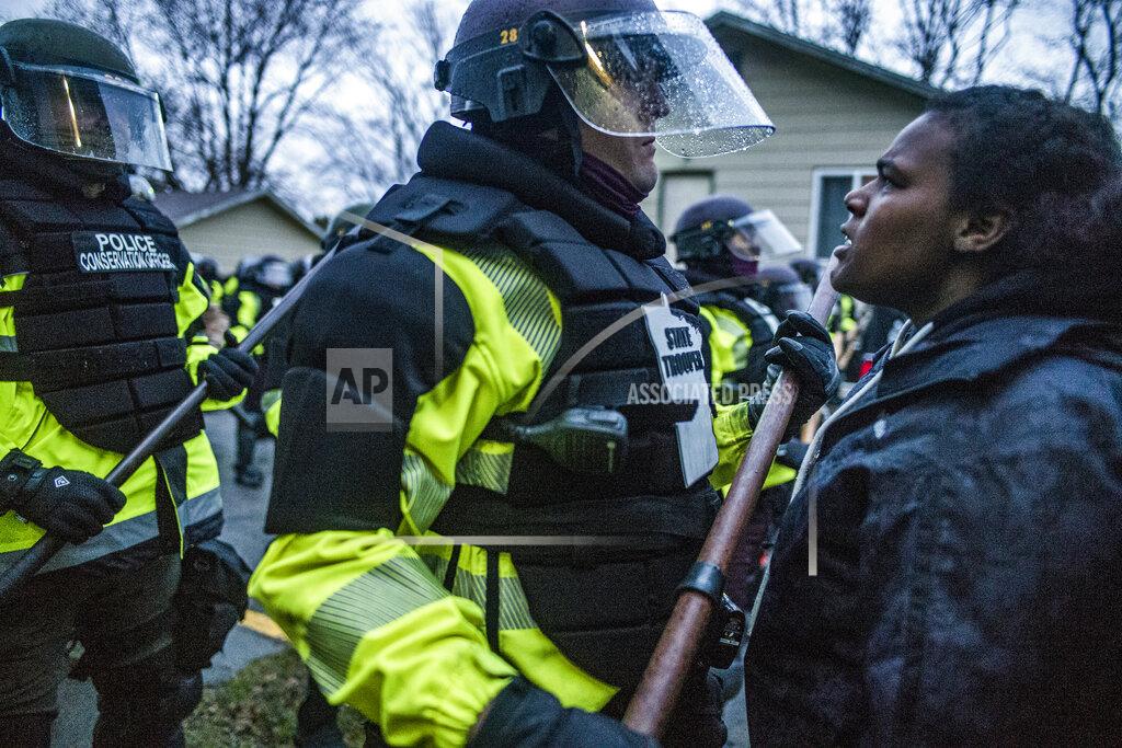 Richard Tsong-Taatarii Protesters clash with police over the shooting death of Daunte Wright at a rally at the Brooklyn Center Police Department Monday, April 12, 2021, in Brooklyn Center, Minn. (Richard Tsong-Taatarii/Star Tribune via AP)