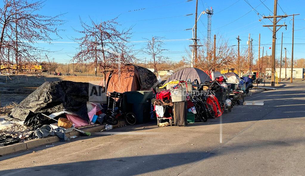Tim Vandenack A tent city encampment along 33rd Street in Ogden, Utah, is pictured on Wednesday, Dec. 2, 2020. (Tim Vandenack/Standard-Examiner via AP)