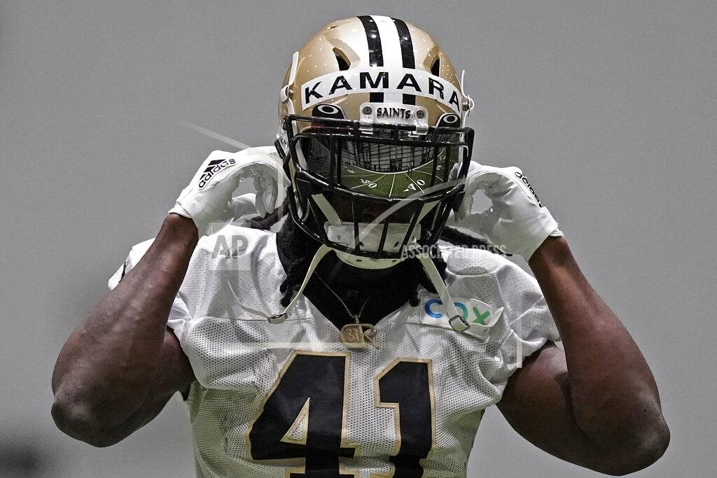 Gerald Herbert The field is reflected in the visor of New Orleans Saints running back Alvin Kamara (41) during practice at their NFL football training facility in Metairie, La., Wednesday, Sept. 2, 2020. (AP Photo/Gerald Herbert, Pool)
