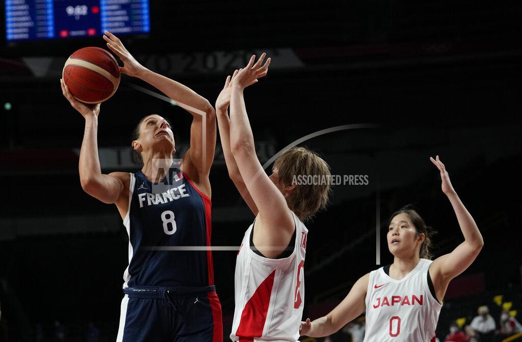 Eric Gay France's Helena Ciak (8), left, shoots over Japan's Maki Takada (8) during women's basketball preliminary round game at the 2020 Summer Olympics, Tuesday, July 27, 2021, in Saitama, Japan. (AP Photo/Eric Gay)